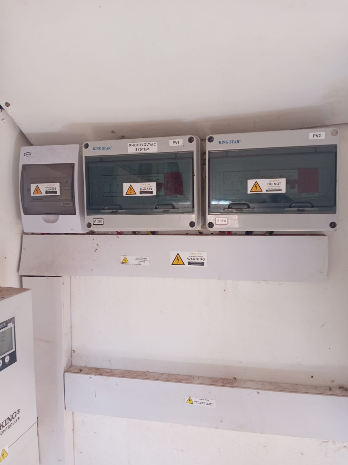 King Star PV1 and PV2 photovoltaic system combiner boxes with danger warning labels for dual-MPPT system